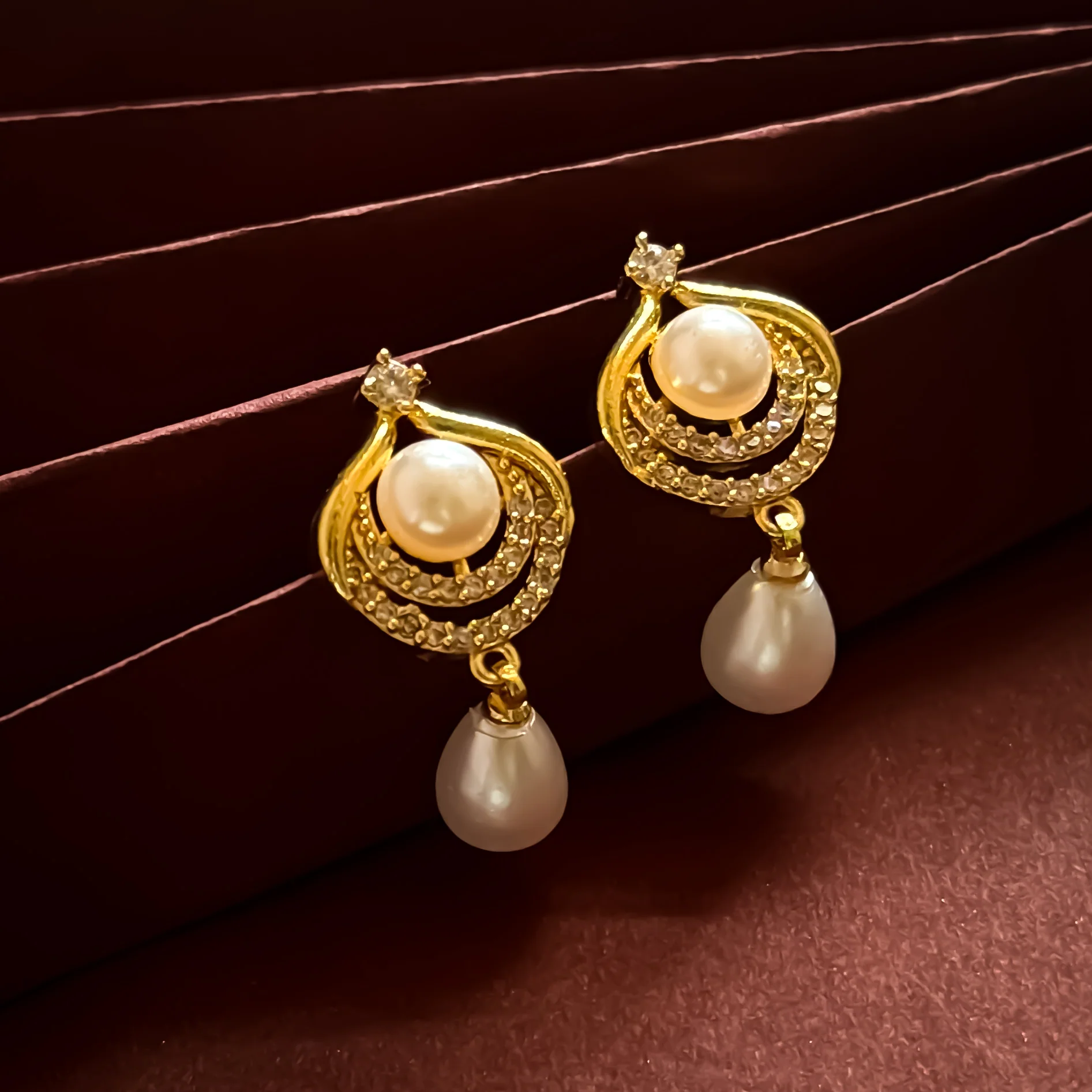 Alice American Diamond Pearl Drop Golden Stud Earrings - Image 3